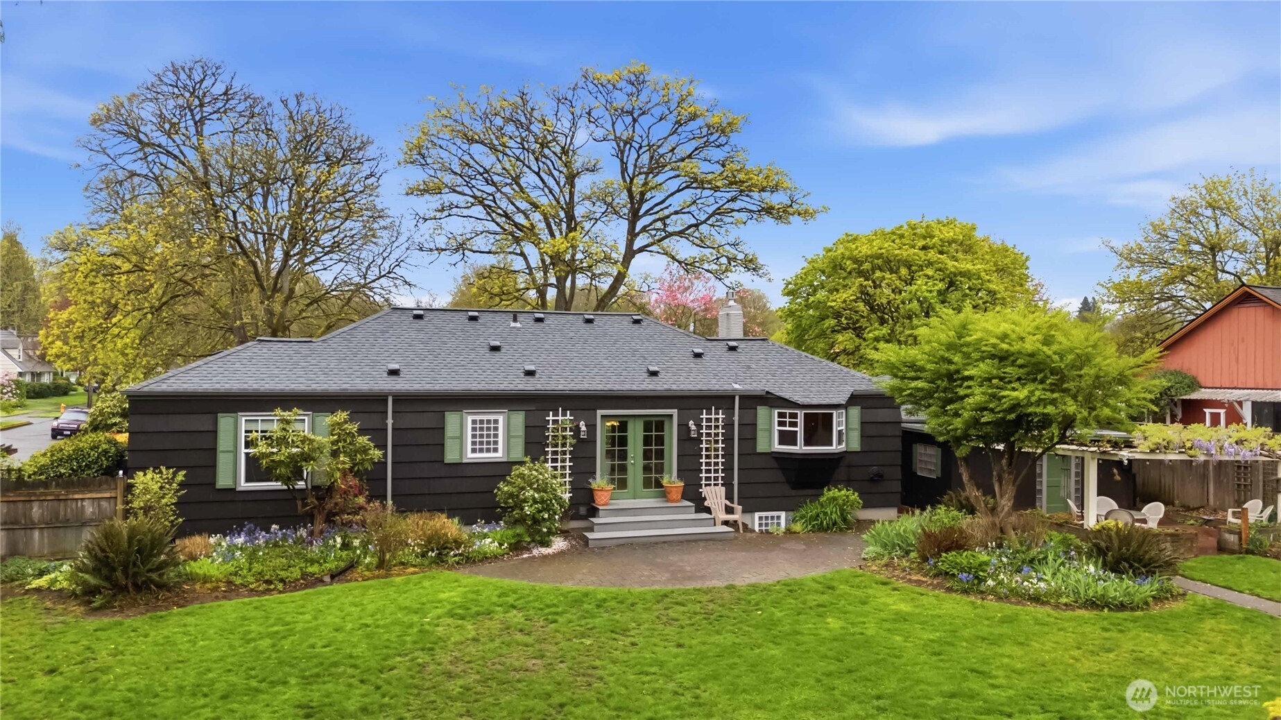 1306 23rd Avenue Longview, WA 98632 - Photo 35 of 40 a front view of a house with garden and porch