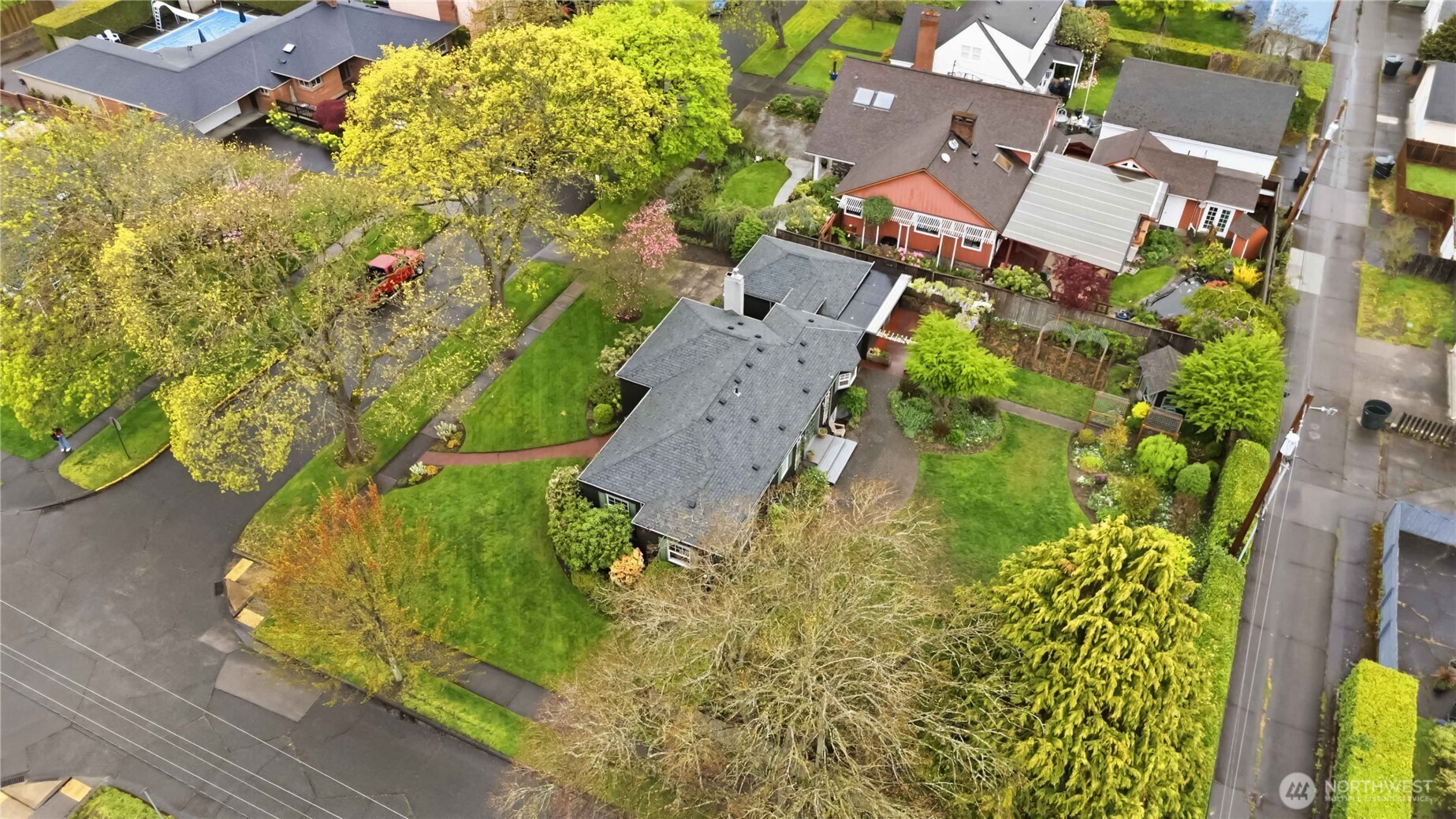 1306 23rd Avenue Longview, WA 98632 - Photo 38 of 40 an aerial view of residential house with yard and swimming pool