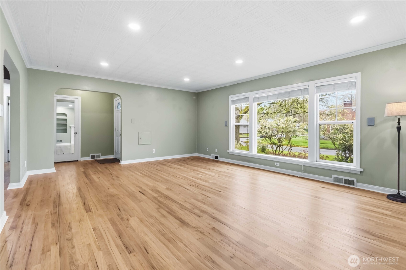 1306 23rd Avenue Longview, WA 98632 - Photo 7 of 40 a view of empty room with wooden floor and fan