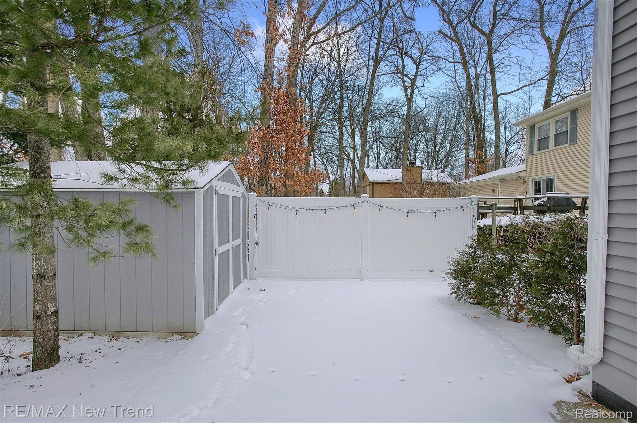 1317 Nightingale Road Wixom, MI 48393 - Photo 32 of 41 32-Backyard 2nd View.jpg