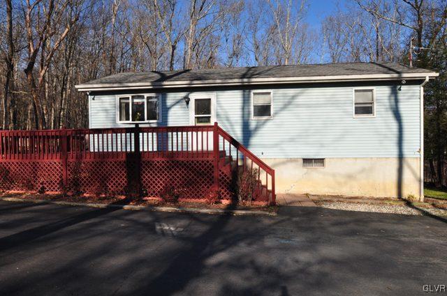 369 Timber Hill Road Henryville, PA 18332 - Photo 1 of 21 a view of a house with a yard