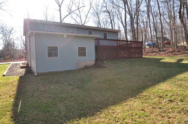 369 Timber Hill Road Henryville, PA 18332 - Photo 21 of 21 a backyard of a house with lots of green space