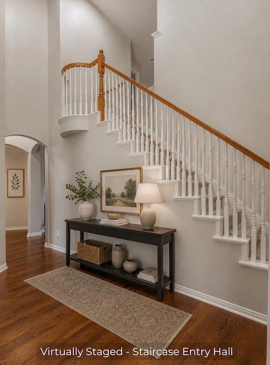 15 Trail Ridge Drive Melissa, TX 75454 - Photo 11 of 38 Grand entry hall featuring wood-finish flooring and a staircase with white balusters and a wood handrail
