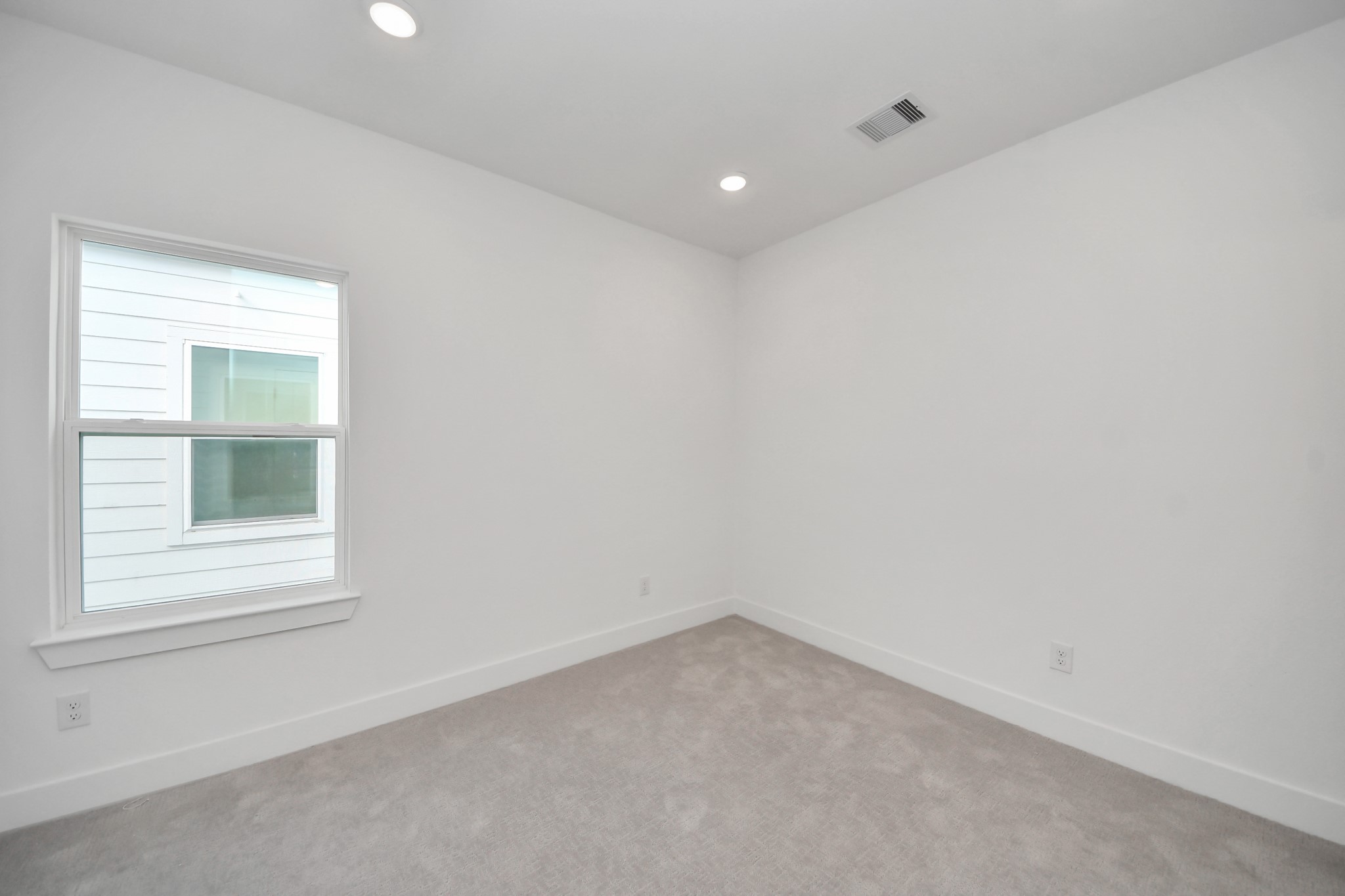 2708 Bostic Street, Unit B Houston, TX 77093 - Photo 18 of 26 an empty room with a window