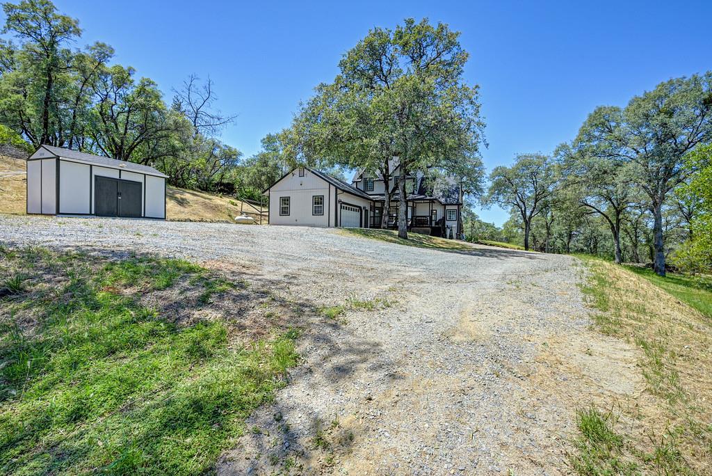 3154 Twin K Road Pilot Hill, CA 95664 - Photo 14 of 89 a view of a house with a yard and large tree