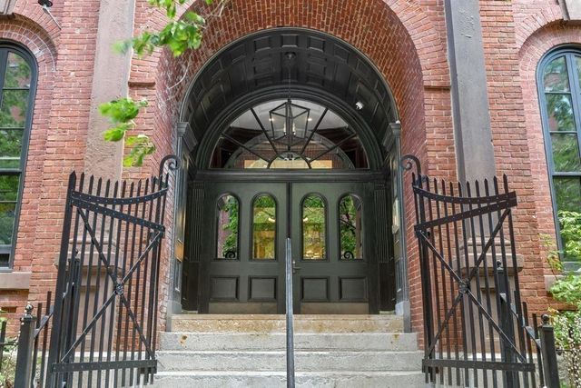 front view of a building with parking