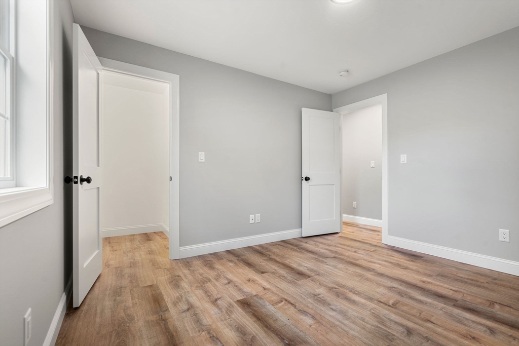 249 Brookside Road Orange, MA 01364 - Photo 24 of 37 a view of hallway with wooden floor