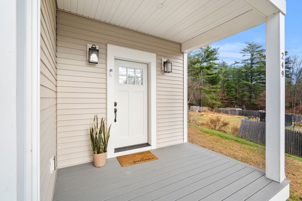249 Brookside Road Orange, MA 01364 - Photo 3 of 37 a view of a door and wooden floor in front of door