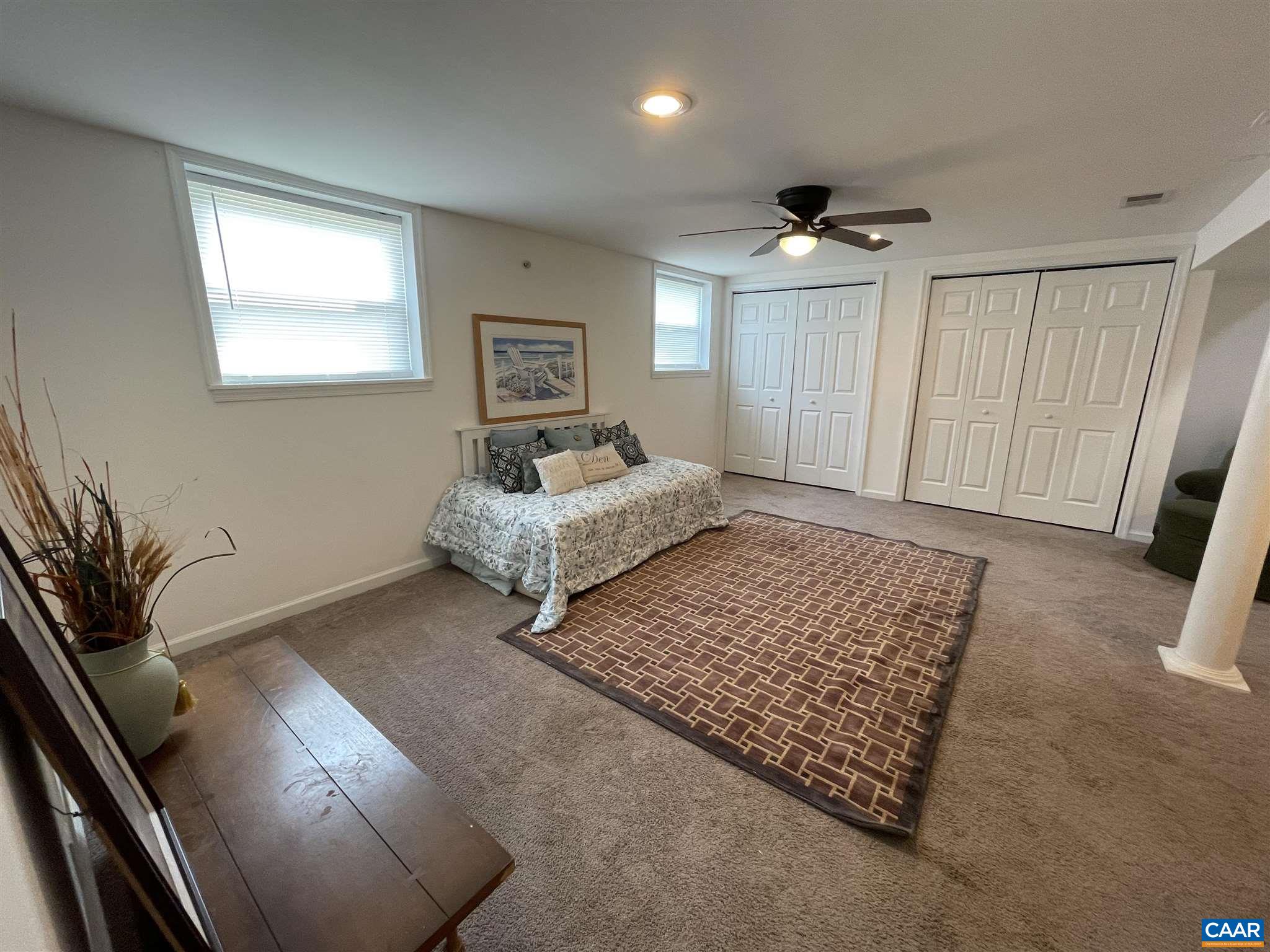 2309 Wakefield Road Charlottesville, VA 22901 - Photo 5 of 28 a living room with furniture and a rug