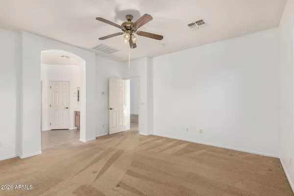 a view of a big room with carpet