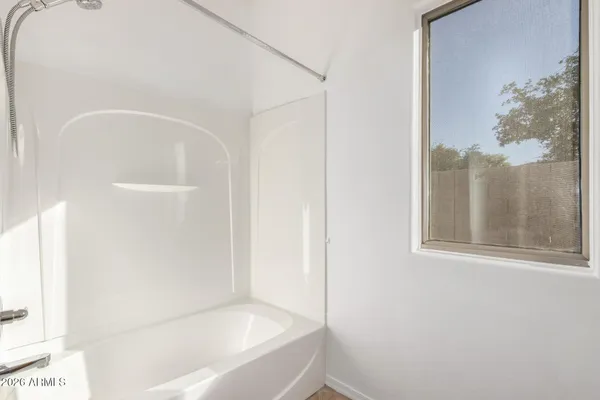 a bathroom with a bathtub