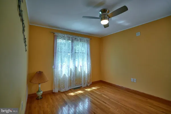 a view of a livingroom with wooden floor