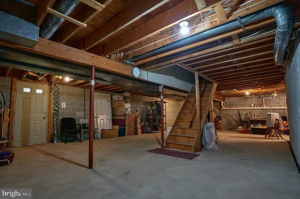 a view of entryway with wooden wall