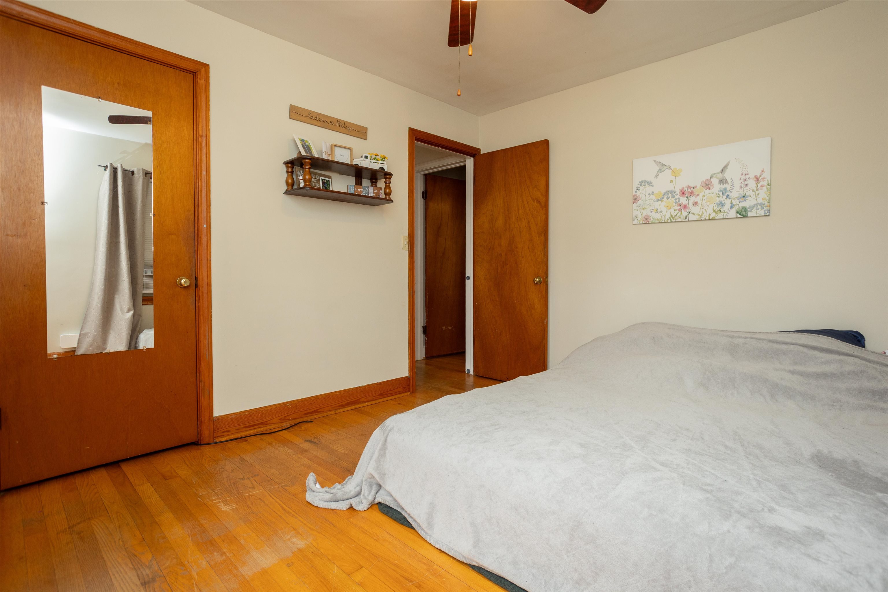 211 George Street Staunton, VA 24401 - Photo 14 of 37 a bedroom with a bed and a painting on the wall