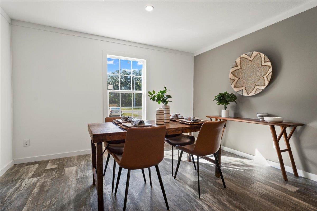 3500 Atcheson Street St. Augustine, FL 32084 - Photo 11 of 29 Dining space featuring dark wood-style flooring, recessed lighting, and crown molding