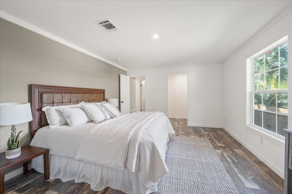 3500 Atcheson Street St. Augustine, FL 32084 - Photo 12 of 29 Bedroom featuring wood finished floors and crown molding
