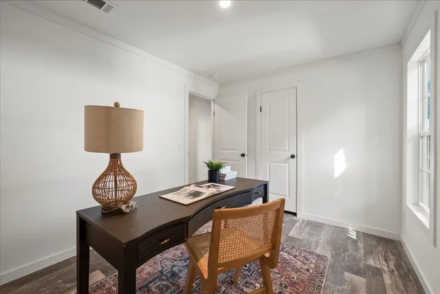 a room with furniture and wooden floor