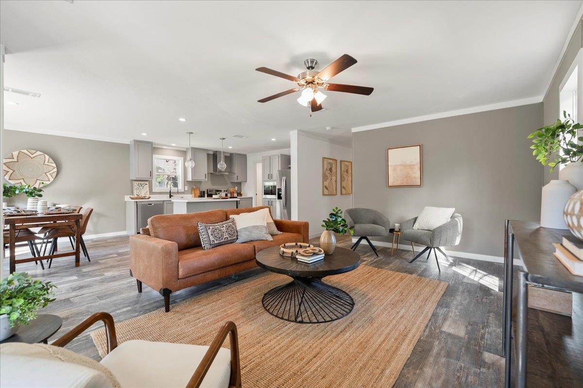 3500 Atcheson Street St. Augustine, FL 32084 - Photo 6 of 29 Living room featuring ornamental molding, dark wood-style flooring, ceiling fan, and recessed lighting