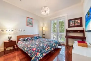 a bed room with a bed and a book shelf