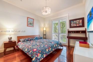 7821 Southwest 54th Court Miami, FL 33143 - Photo 13 of 22 a bedroom with a bed and a window