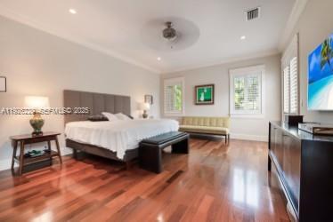 7821 Southwest 54th Court Miami, FL 33143 - Photo 16 of 22 a bedroom with a bed and wooden floor