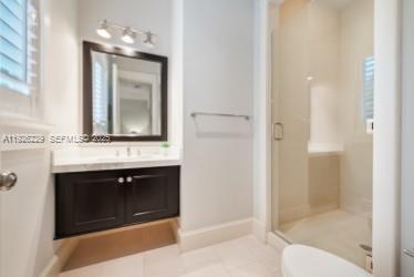 7821 Southwest 54th Court Miami, FL 33143 - Photo 18 of 22 a bathroom with a sink and a mirror