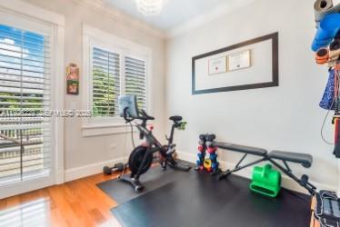 7821 Southwest 54th Court Miami, FL 33143 - Photo 20 of 22 a view of a room with gym equipment