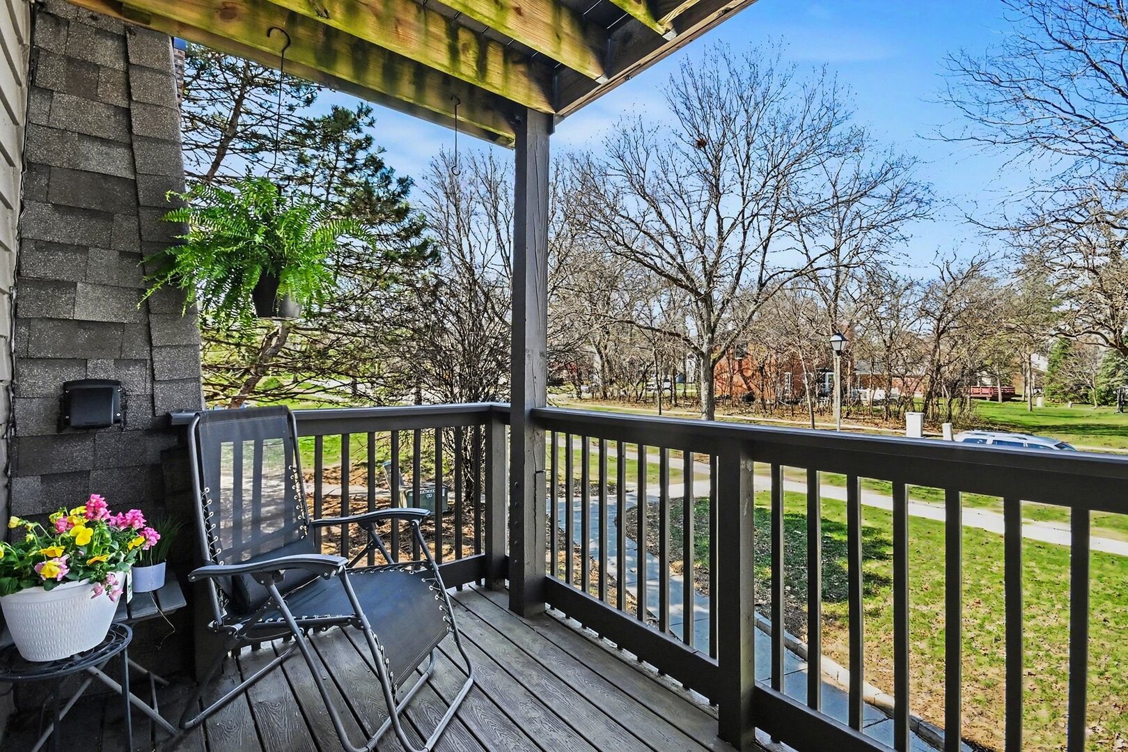 1484 Stonebridge Circle, Unit B6 Wheaton, IL 60189 - Photo 13 of 16 a view of a balcony with furniture