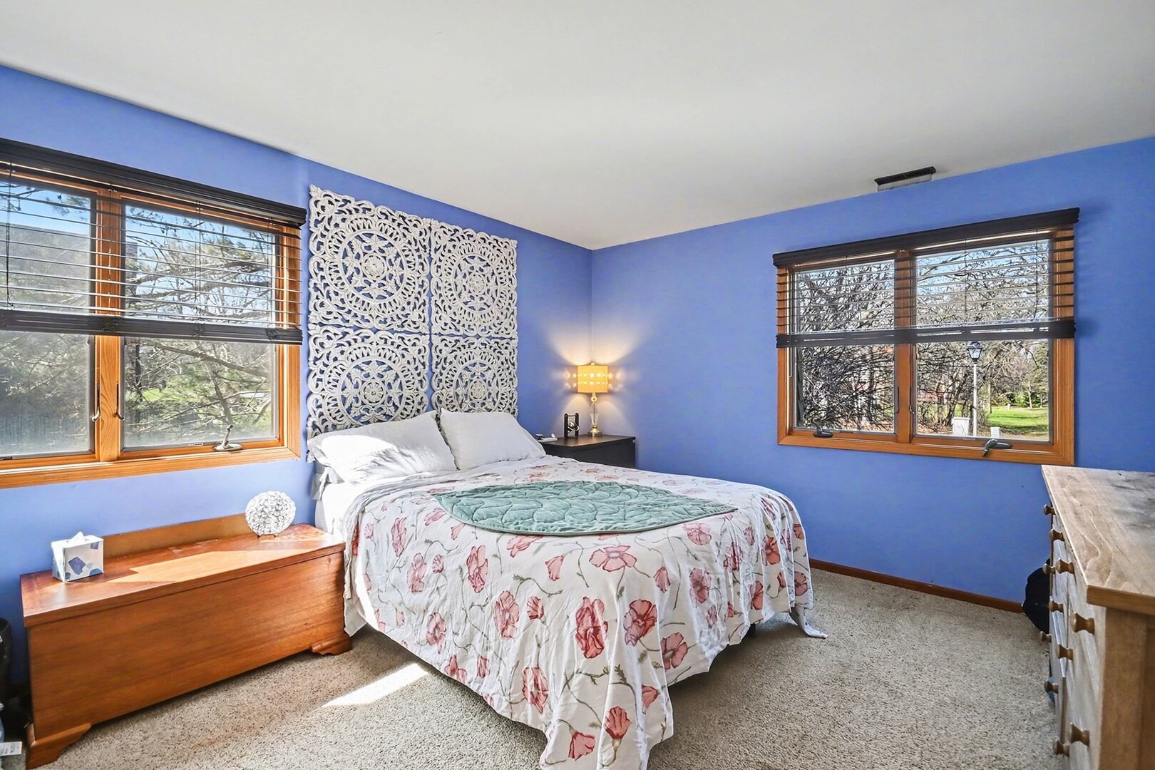 1484 Stonebridge Circle, Unit B6 Wheaton, IL 60189 - Photo 9 of 16 a bed sitting in a bedroom next to a window