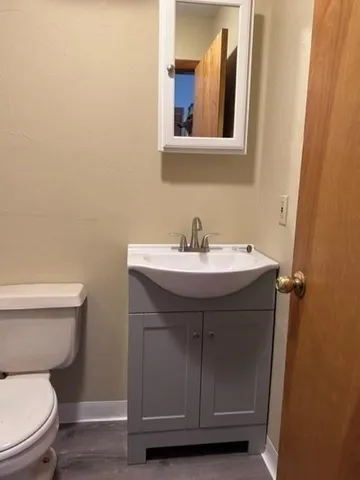 a bathroom with a sink and a toilet