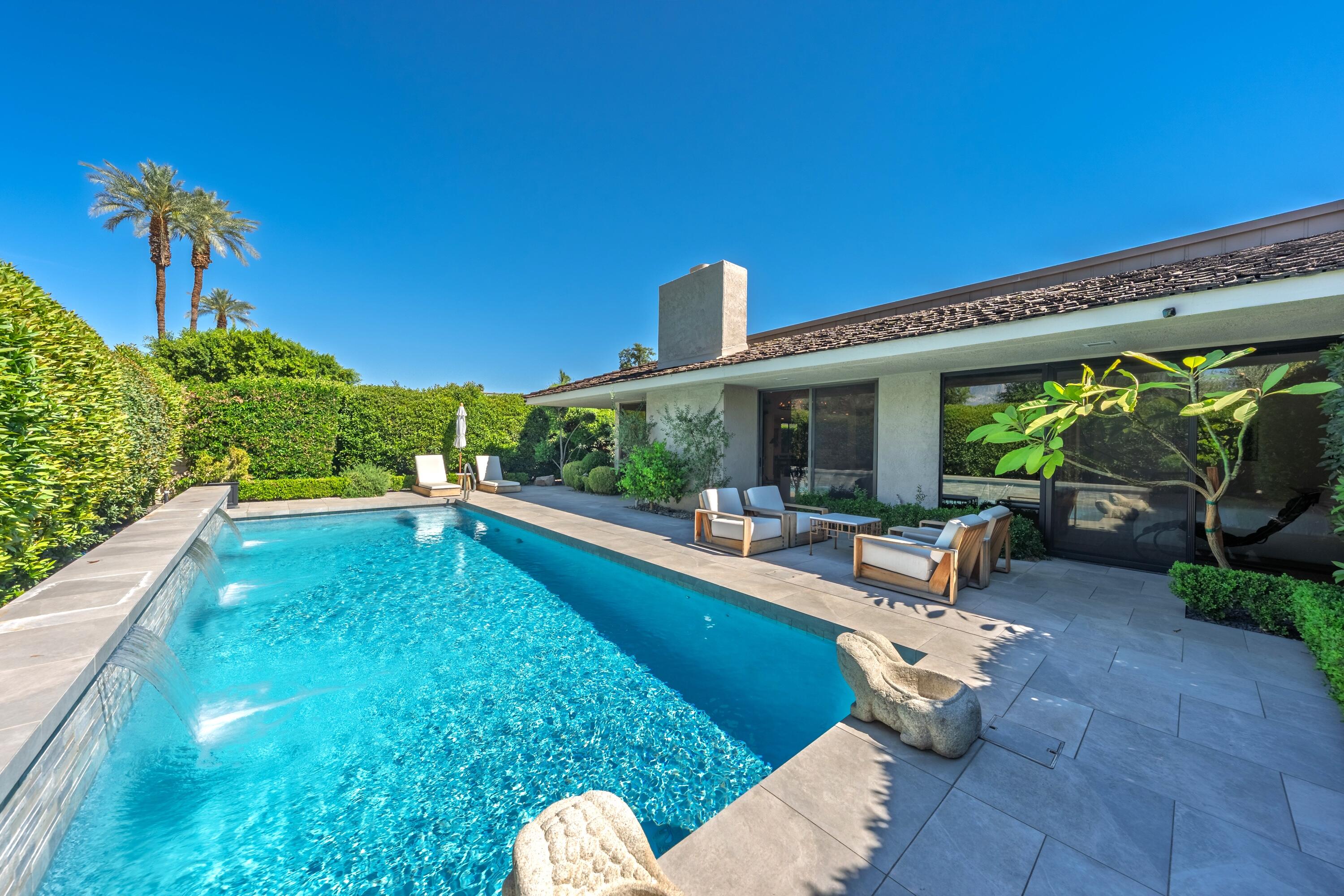 46 Princeton Drive Rancho Mirage, CA 92270 - Photo 12 of 43 a view of a swimming pool with a patio