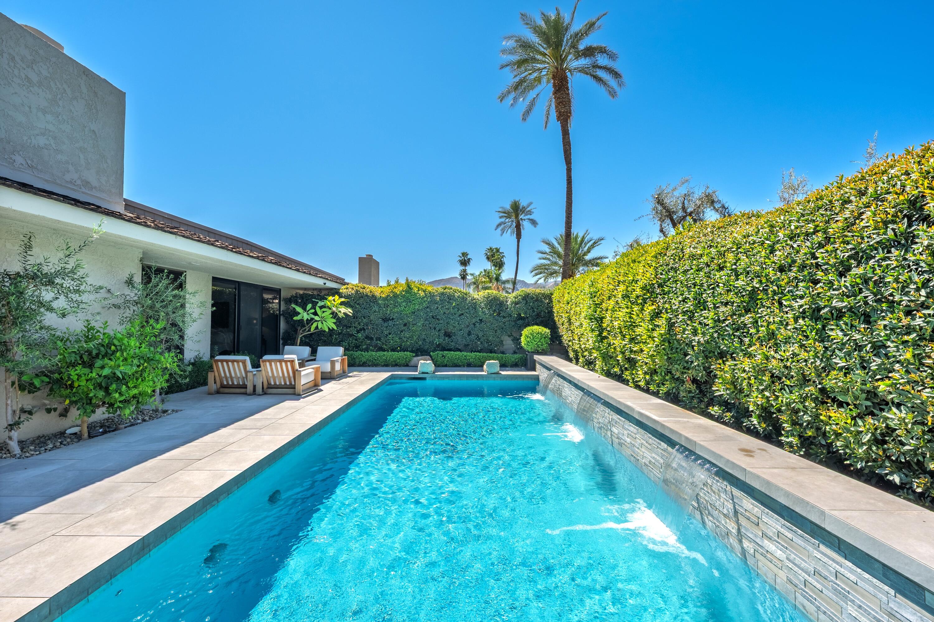 46 Princeton Drive Rancho Mirage, CA 92270 - Photo 15 of 43 a view of a backyard with plants and a patio
