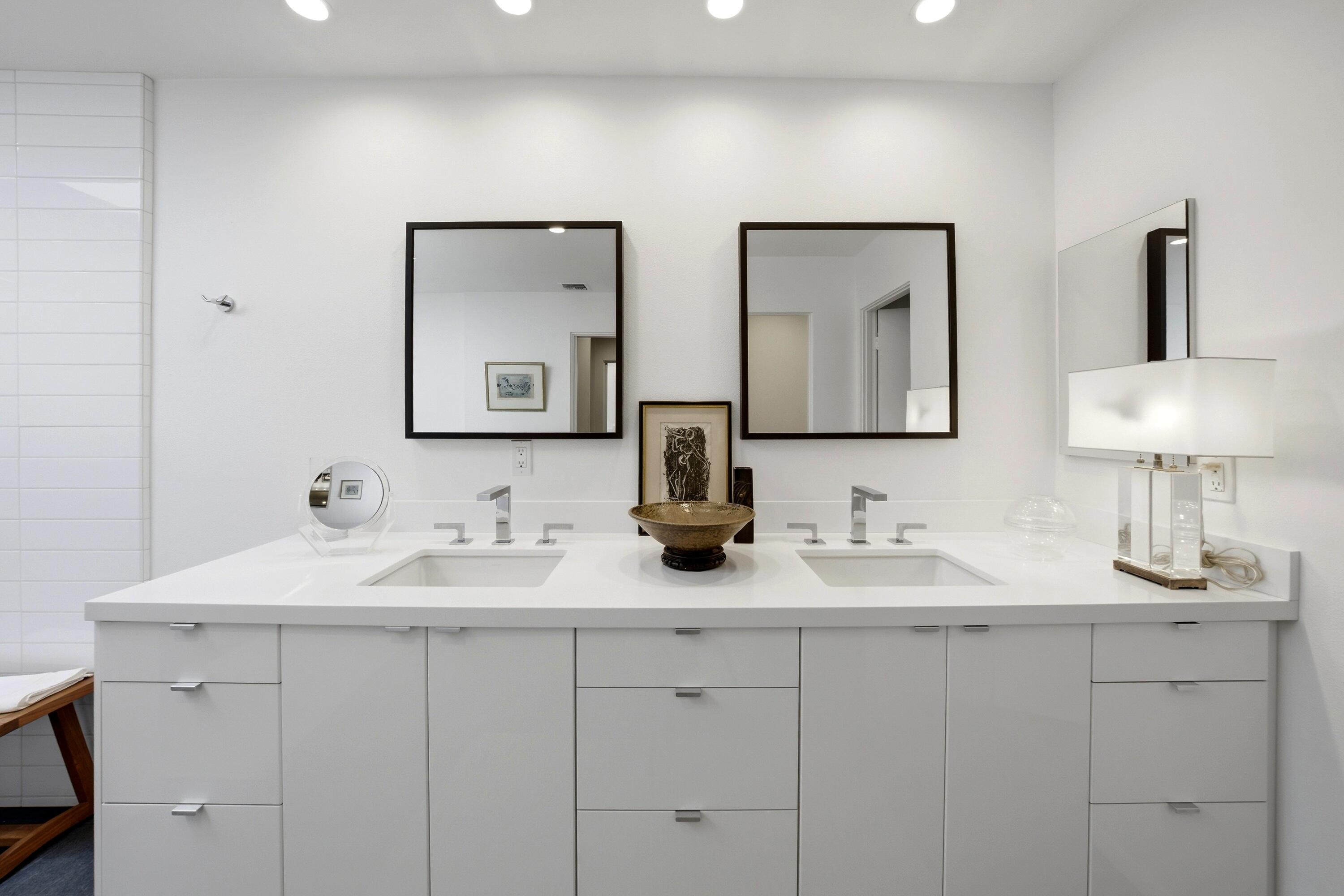 46 Princeton Drive Rancho Mirage, CA 92270 - Photo 35 of 43 a bathroom with double vanity sinks and a mirror