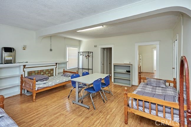 412 East 16th Street Long Beach, CA 90813 - Photo 6 of 8 a living room with furniture and a wooden floor