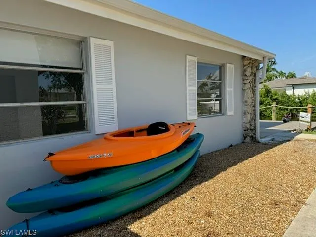 a bed room with a bed and window