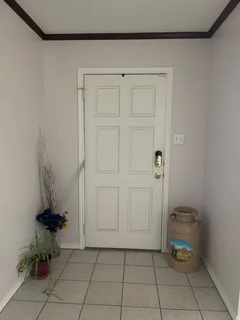 a view of an entryway with seating area