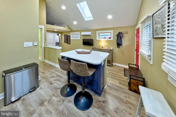 a room with furniture and wooden floor