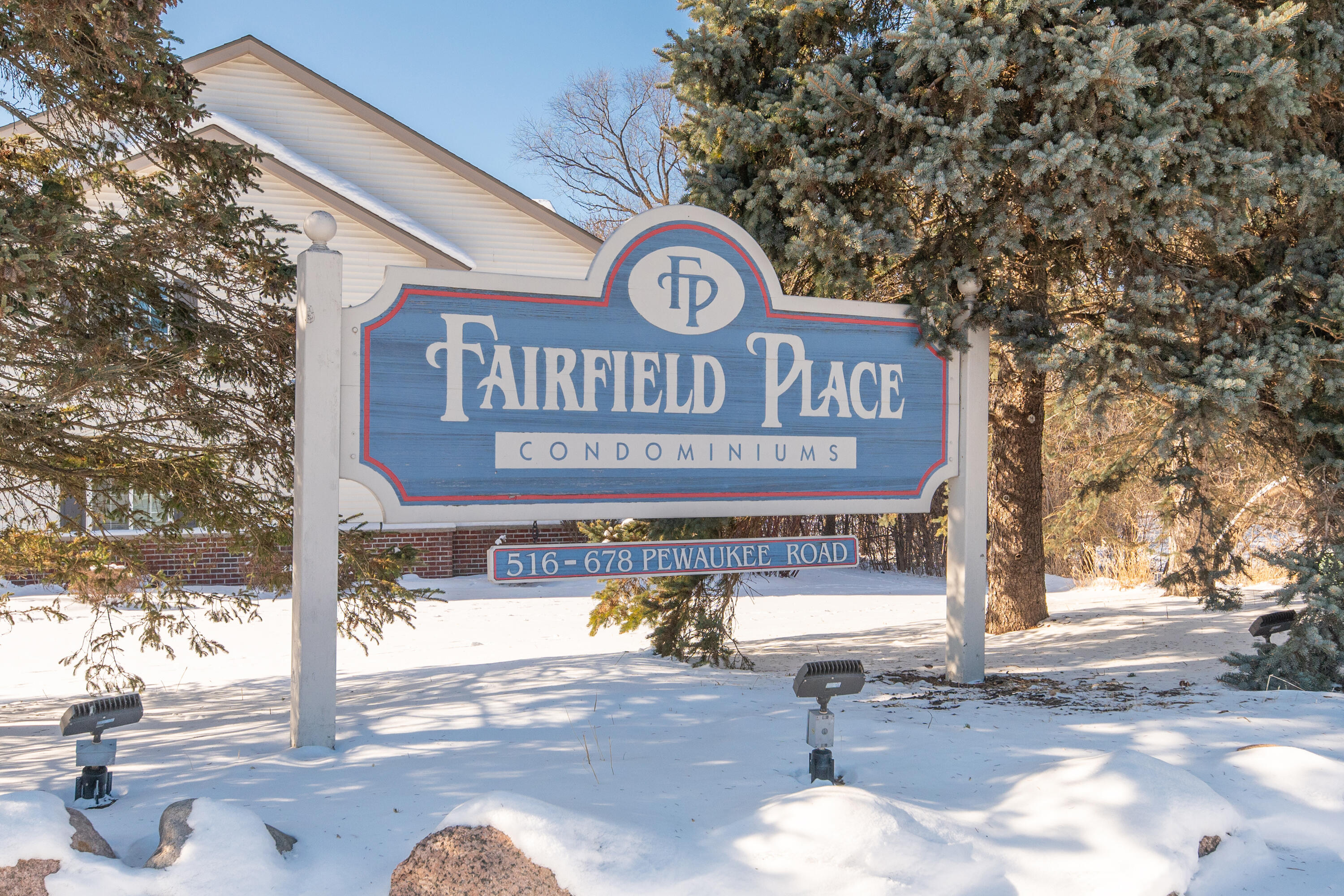 590 Pewaukee Road, Unit E Pewaukee, WI 53072 - Photo 27 of 34 Sign