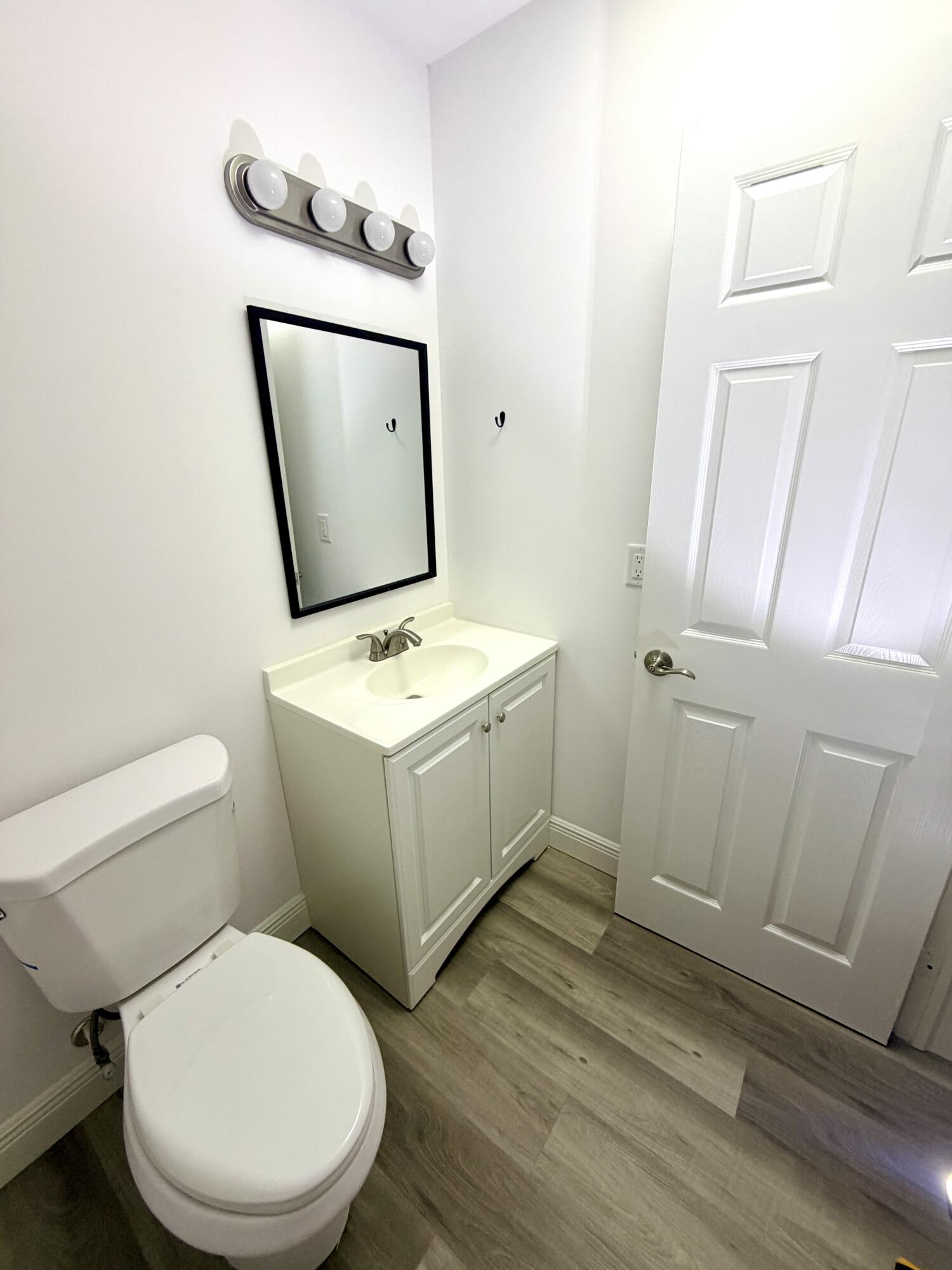 1766 Abbey Road, Unit 105 West Palm Beach, FL 33415 - Photo 3 of 8 ___F105 bath 2