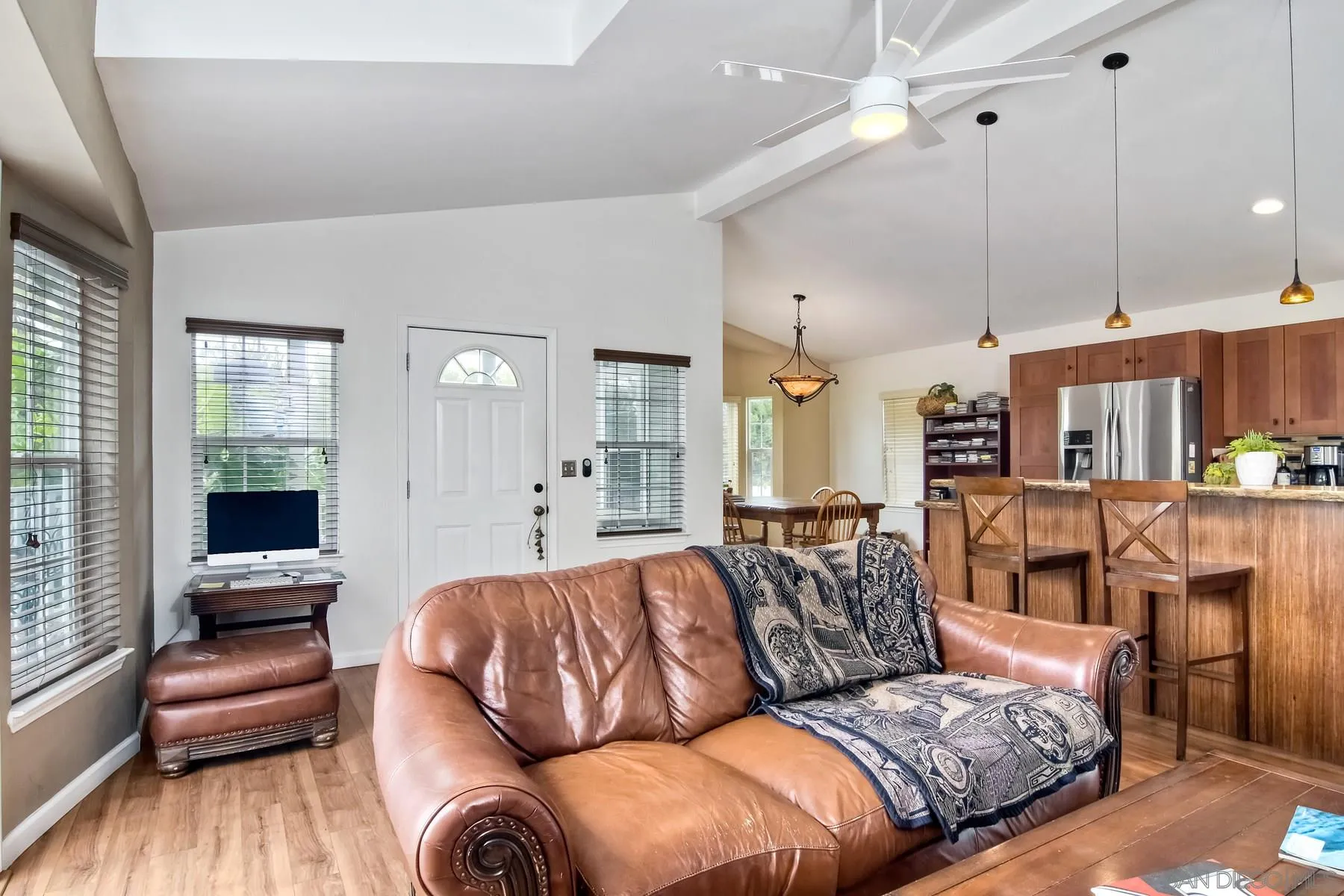 1245 Windsor Road Encinitas, CA 92007 - Photo 7 of 25 a living room with furniture fireplace and wooden floor