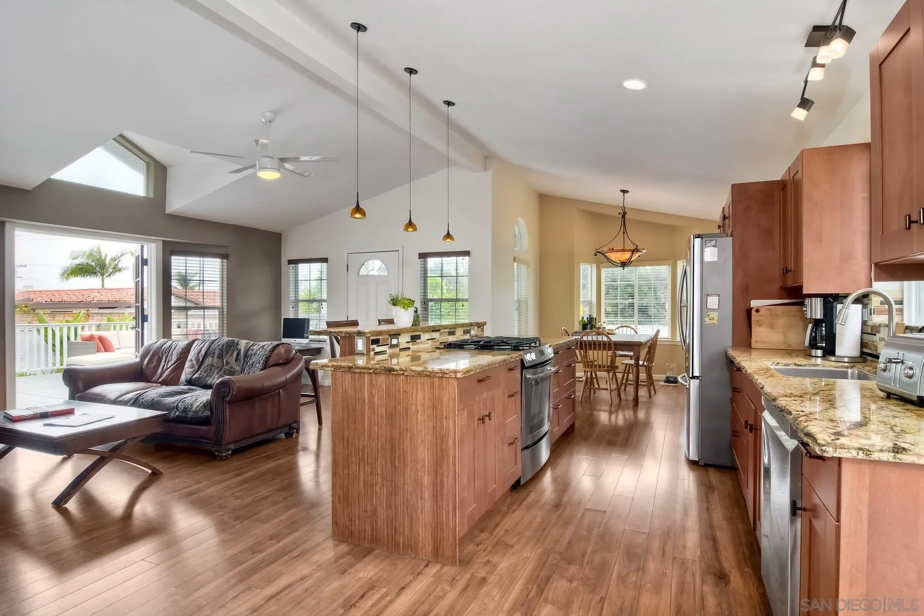 1245 Windsor Road Encinitas, CA 92007 - Photo 10 of 25 a large kitchen with lots of counter space a sink appliances and a large window