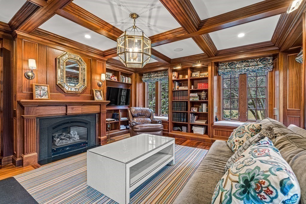 15 Woodcliff Road Wellesley, MA 02481 - Photo 12 of 31 a living room with furniture a fireplace and a chandelier