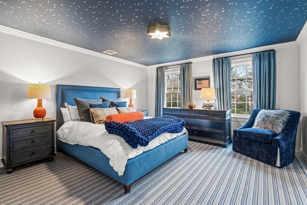 15 Woodcliff Road Wellesley, MA 02481 - Photo 21 of 31 a bedroom with a bed and wooden floor