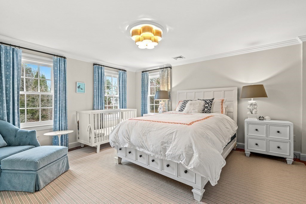 15 Woodcliff Road Wellesley, MA 02481 - Photo 22 of 31 a bedroom with a bed and a couch