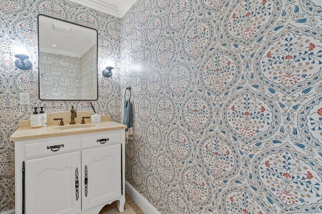 15 Woodcliff Road Wellesley, MA 02481 - Photo 24 of 31 a bathroom with a sink and a mirror