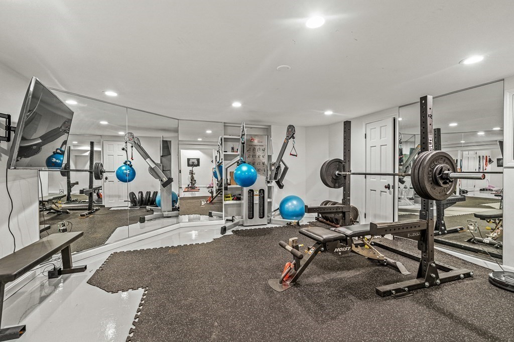 15 Woodcliff Road Wellesley, MA 02481 - Photo 27 of 31 a view of a room with gym equipment