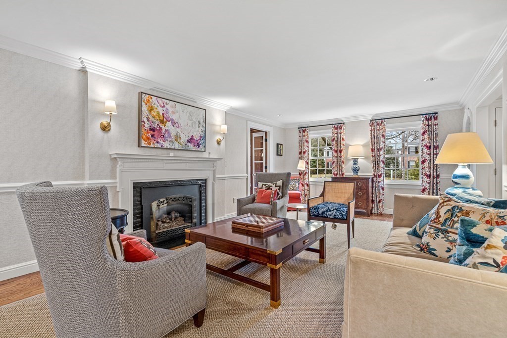 15 Woodcliff Road Wellesley, MA 02481 - Photo 5 of 31 a living room with furniture and a fireplace