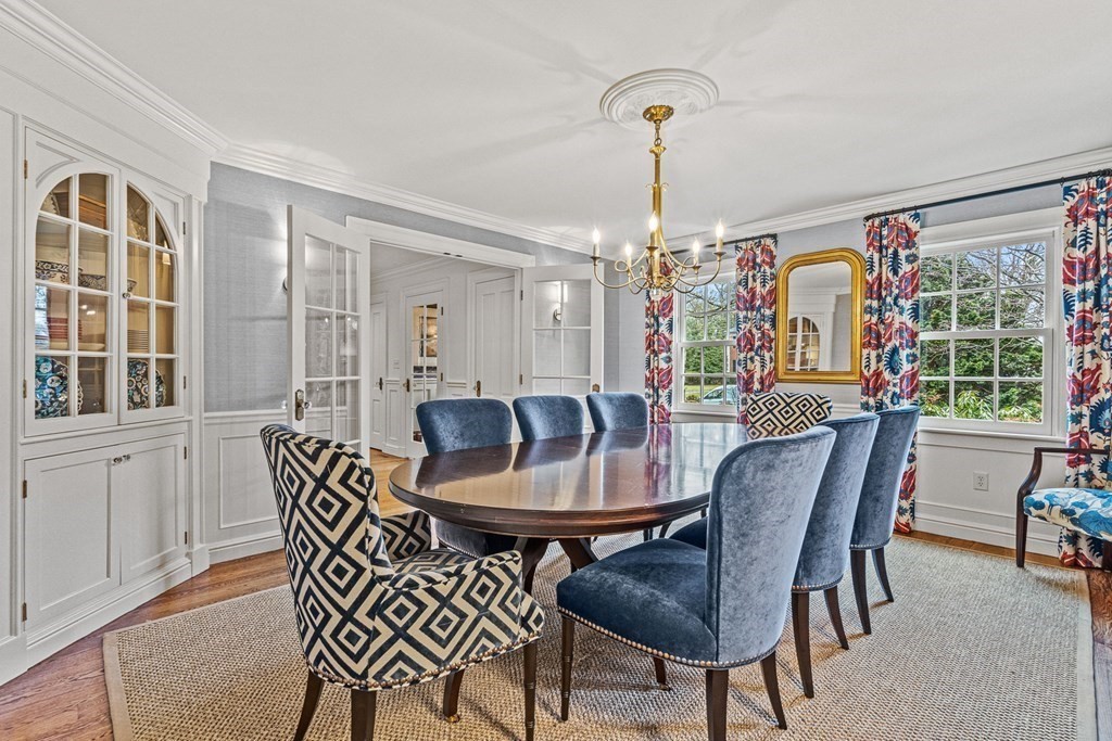 15 Woodcliff Road Wellesley, MA 02481 - Photo 7 of 31 a view of a dining room with furniture window and outside view