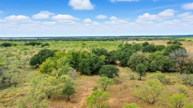 a view of a city with an ocean view