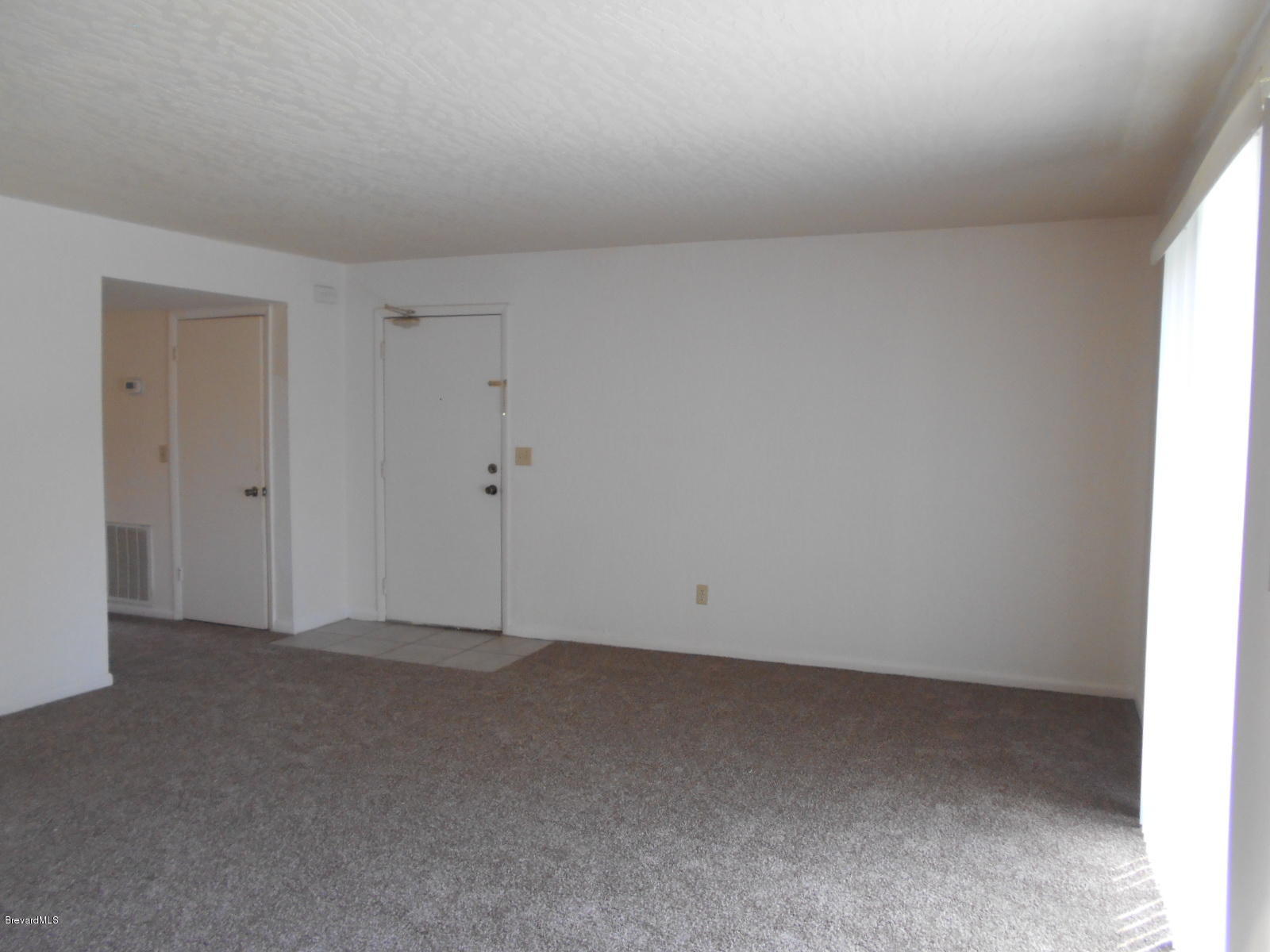 3624 Tree Ridge Lane Northeast Palm Bay, FL 32905 - Photo 21 of 38 Living Room